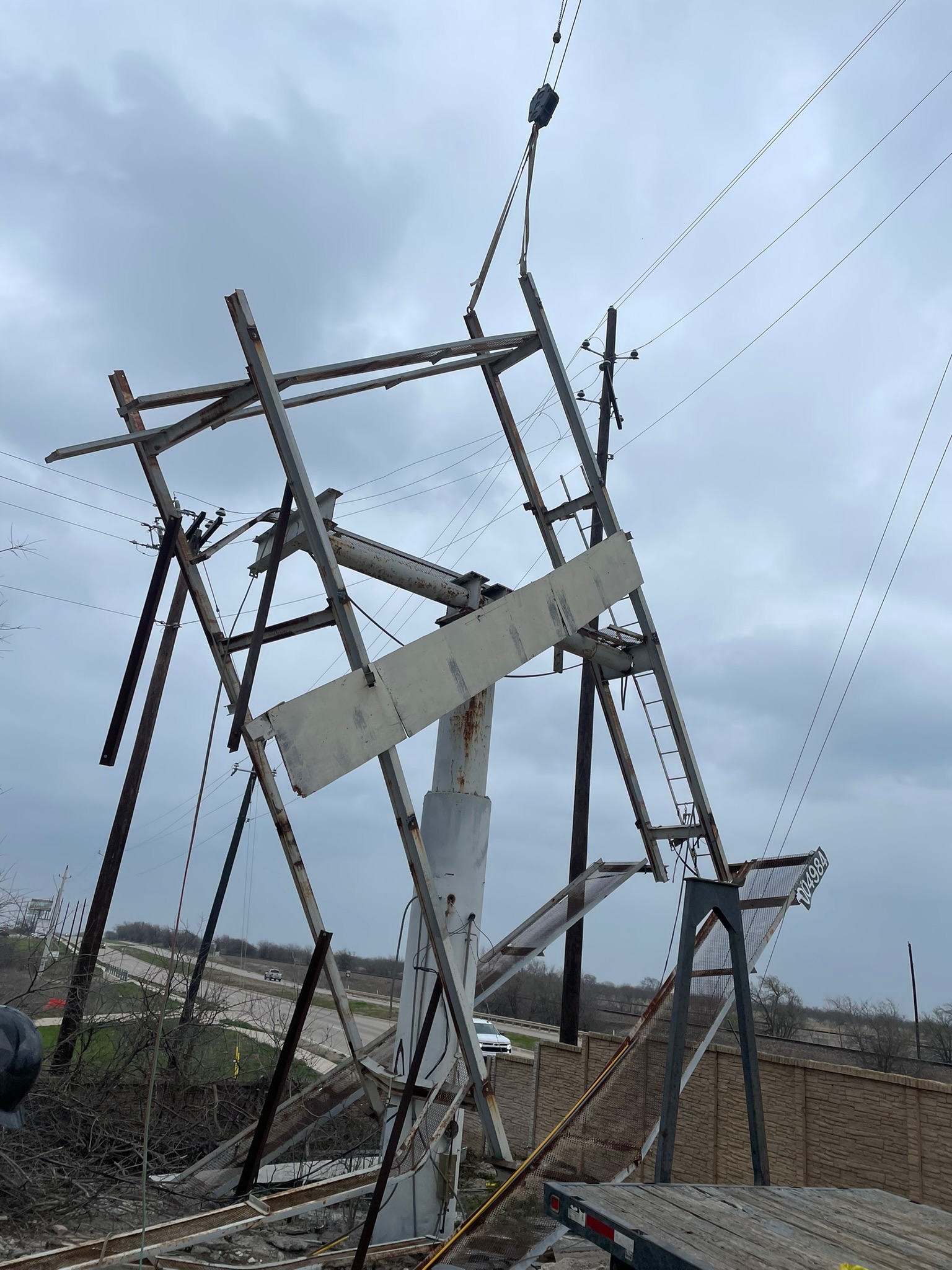 Billboard storm recovery — post-hurricane restoration